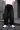 Pantaloni de blugi negri pentru bărbați, cu croială largă și aspect șlefuit